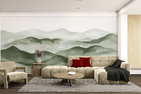 Forest green mountain wall mural with soft ink wash effect for living room.