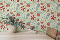 Elegant cream wallpaper with colorful folk art bird and flower prints.