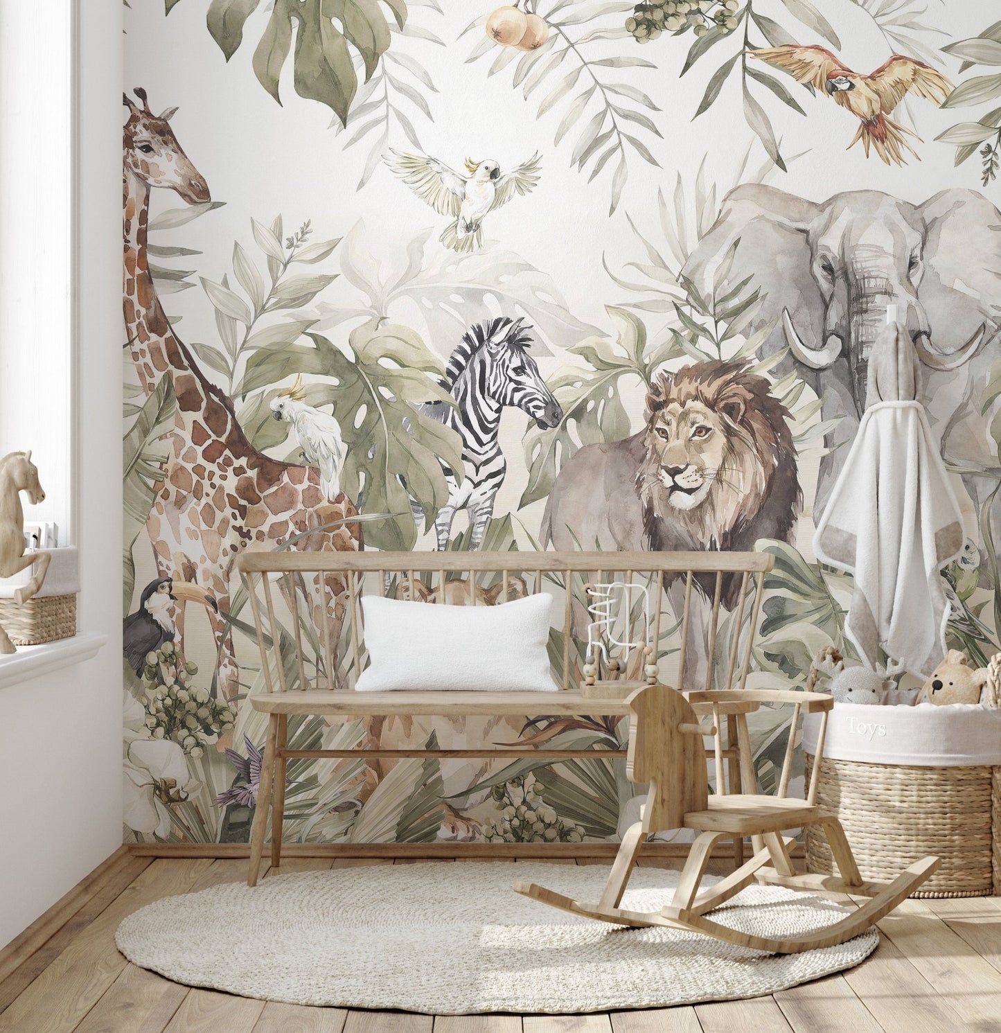 Large forest wall mural in a playroom with wooden furniture.