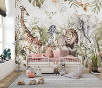 Forest fauna wall mural with jungle leaves and african animals in a bedroom.