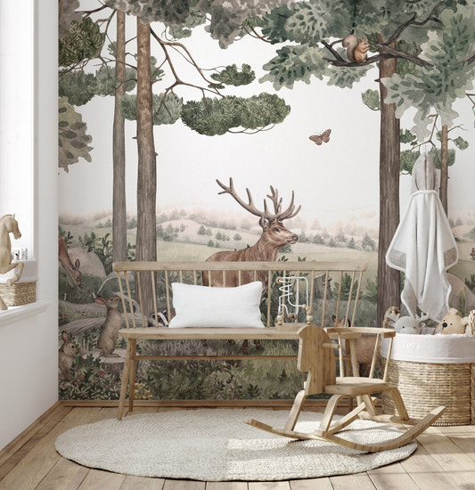 Watercolor forest wall mural featuring soft green pine trees and brown foxes.