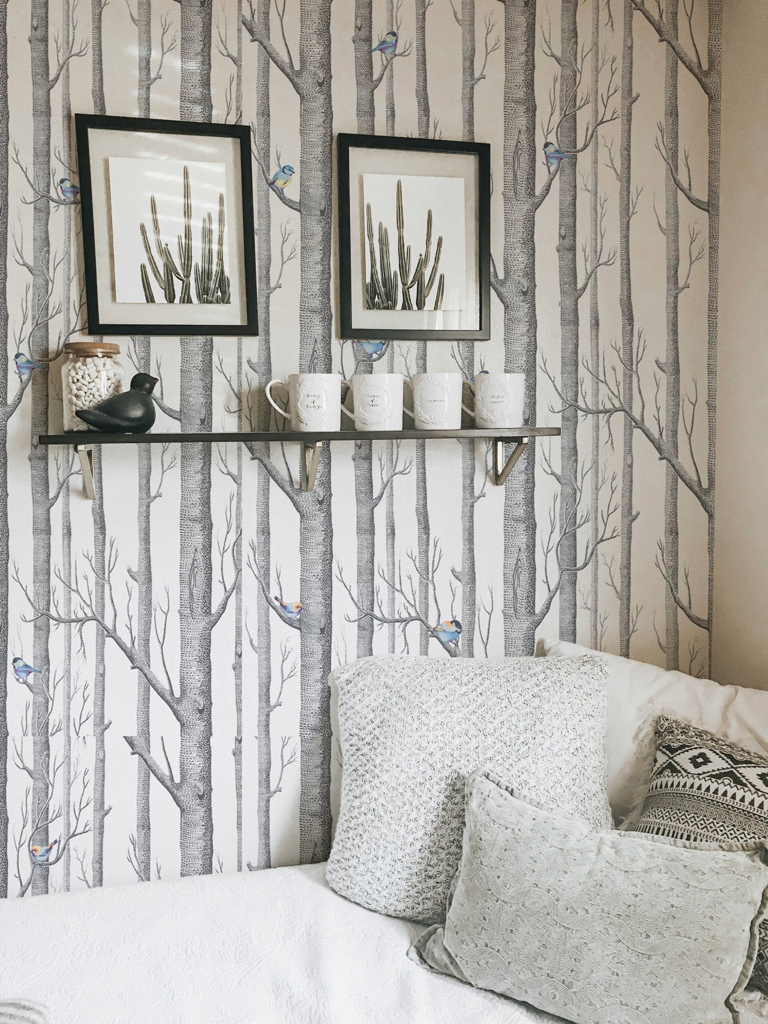 Scandinavian style wallpaper featuring vertical tree trunks in a modern home.