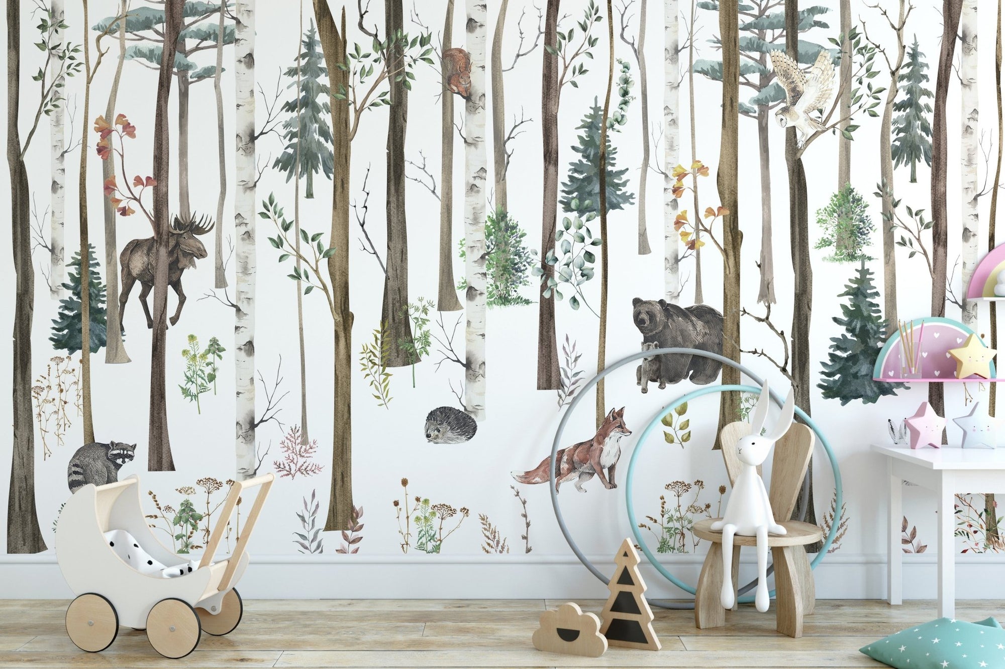 Kids play area with woodland animal wall mural