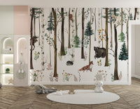 Minimalist playroom with a forest animal wall mural.