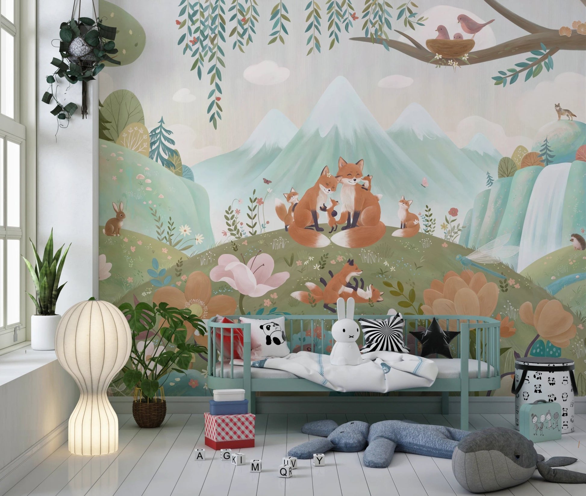 Fox Family Wall Mural featuring orange foxes and grey mountains in a playroom.