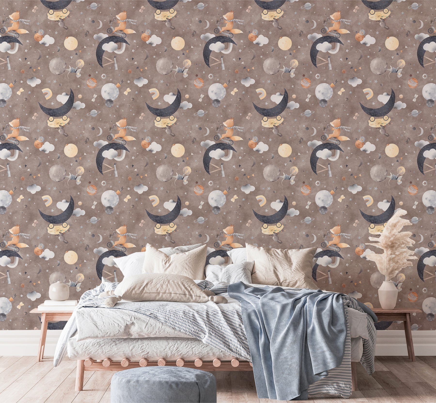 Dark brown celestial animal wallpaper in bedroom behind light linen bed.