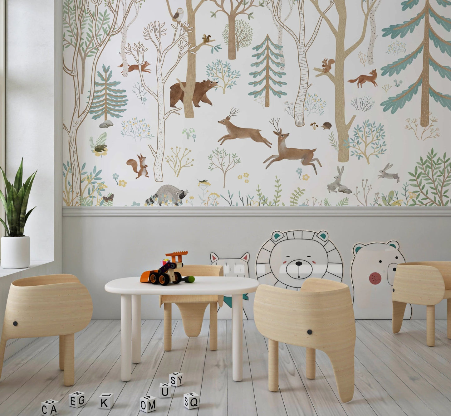 Neutral toned forest wall mural with animal illustrations in a primary classroom.