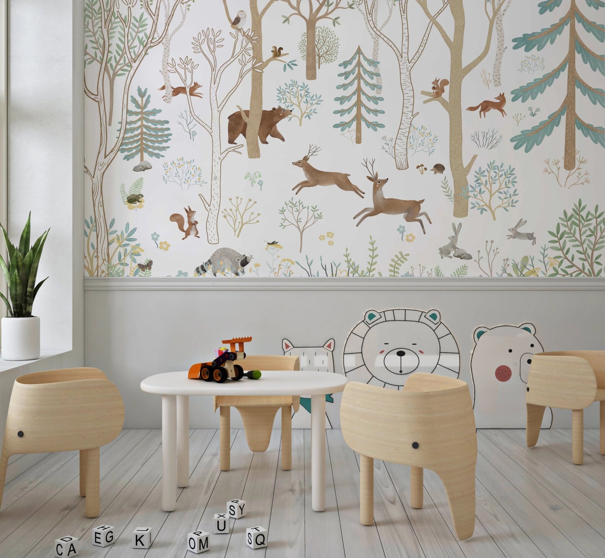 Neutral toned forest wall mural with animal illustrations in a primary classroom.