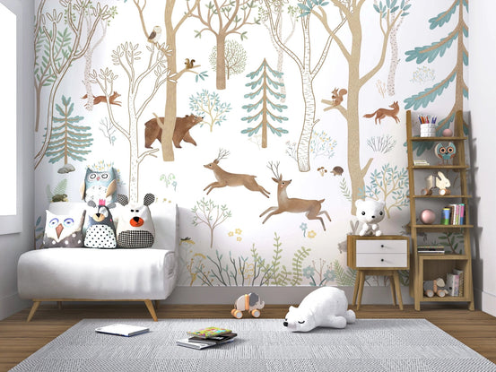 Small seating area for children featuring a forest animal wall mural design.