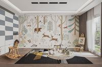 Forest themed wall mural with deer and rabbits in a bright sunlit playroom.