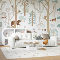 White sofa set against a Frisky Forest Blue Wall Mural in a living area.