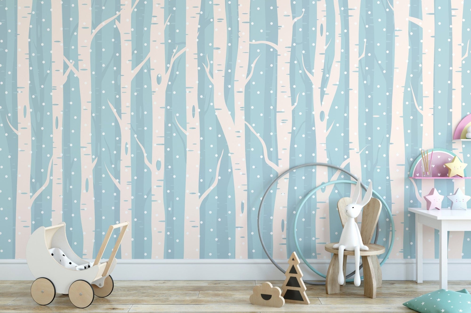 Frosty Blue Forest Scenic Wall Murals in a nursery with a wooden toy stroller.