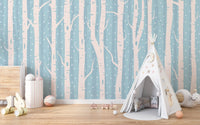 White birch forest wall mural in a toddler room with a canvas teepee.