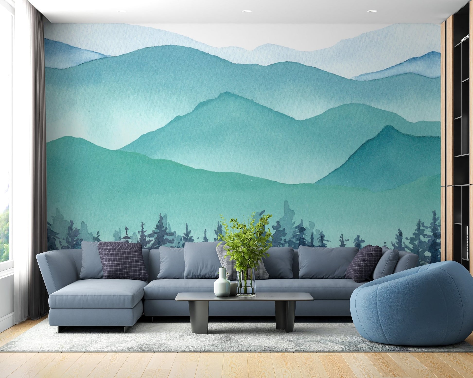 Navy blue sectional sofa set against a watercolor mountain wall mural.