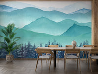 Modern dining room with a watercolor alpine wall mural and indoor green plants.
