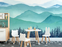 Kids' dining room featuring watercolor mountain wall mural and small white chairs.