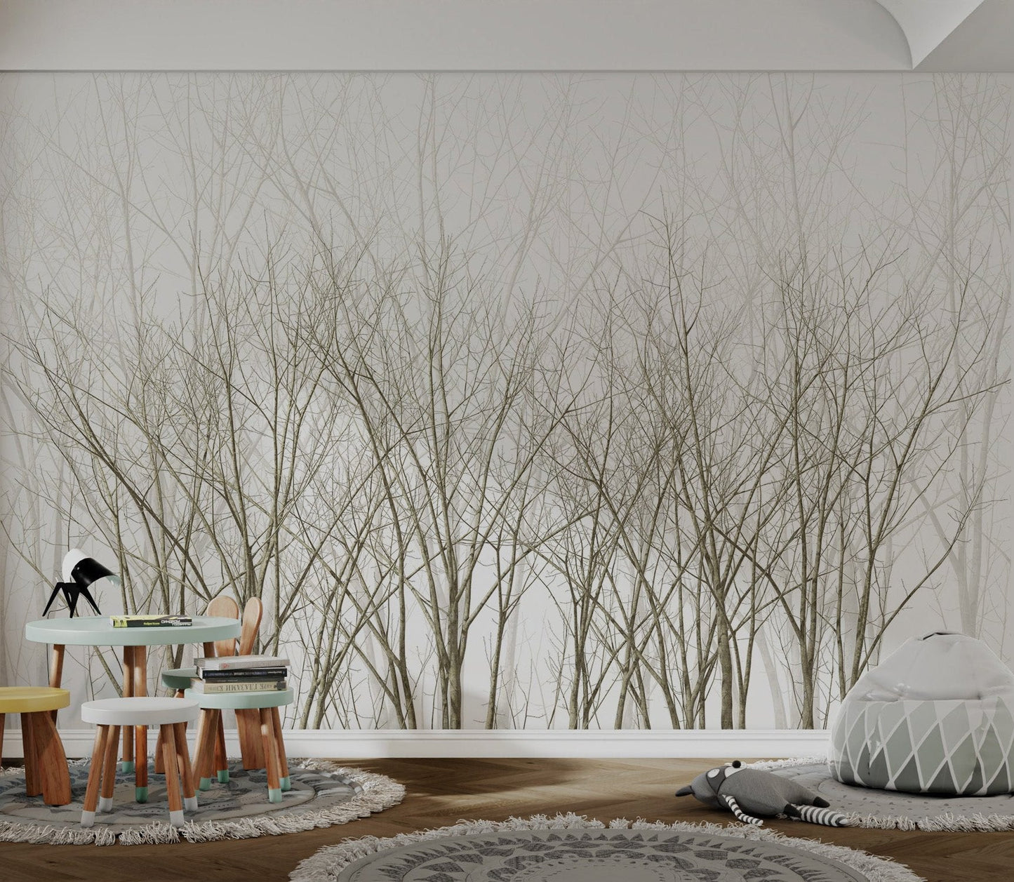 Scandinavian style bare forest wall mural in neutral white tone in playroom.