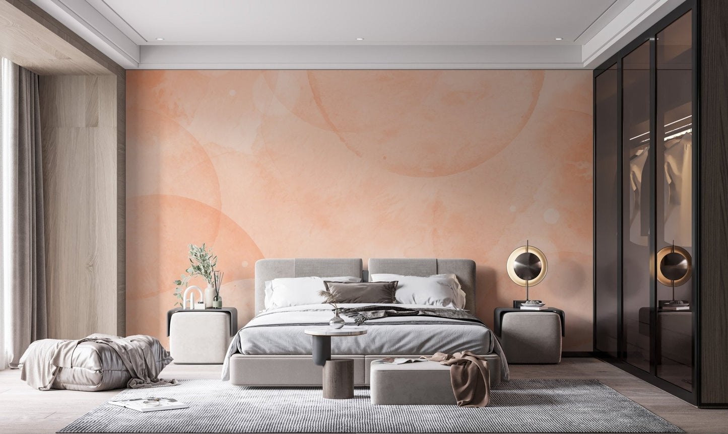 Modern wall mural in fuzzy peach tones with airy watercolor shapes for cozy bedroom.