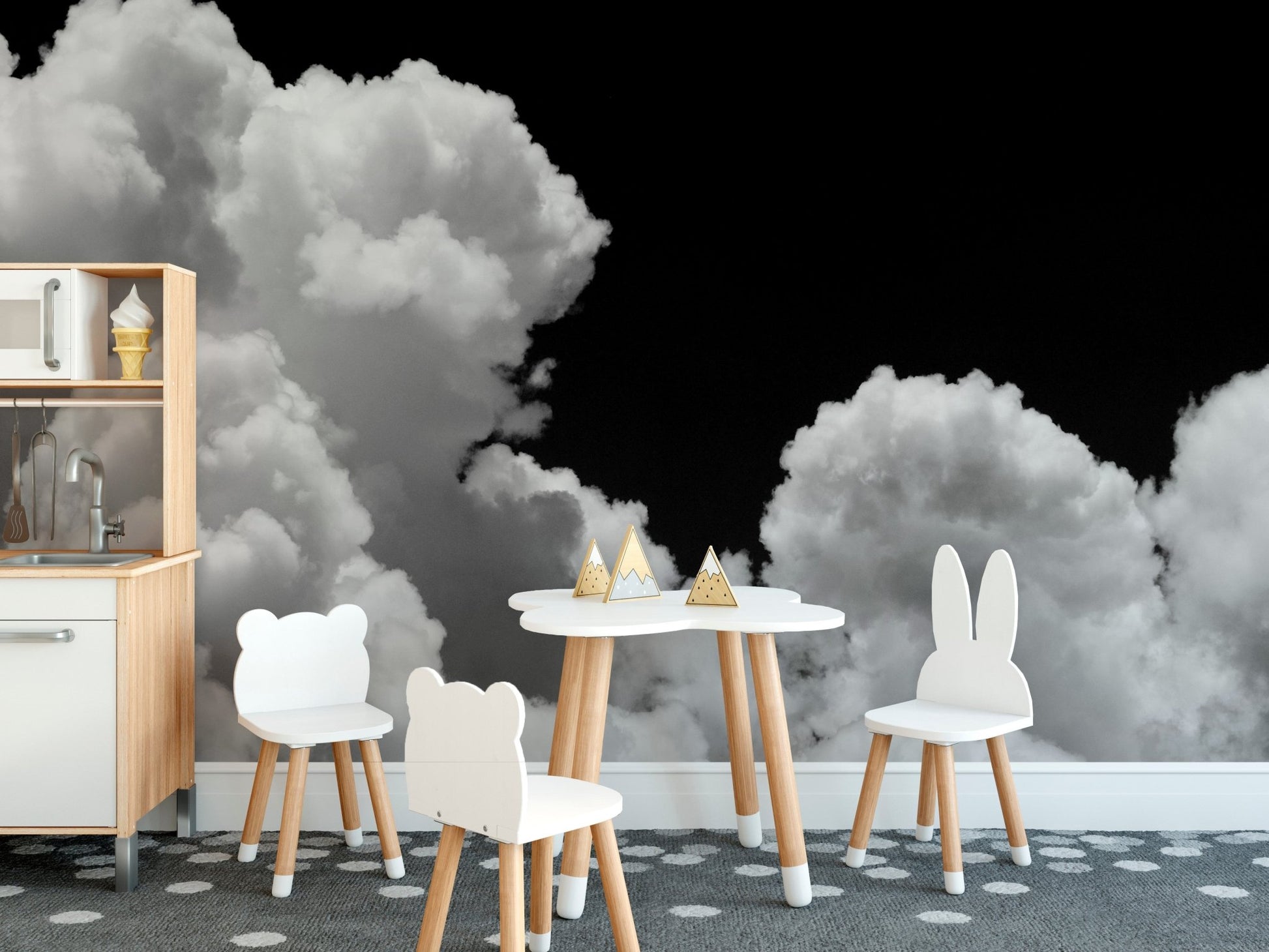 Nursery play area featuring a round table and Galactic Cloudscape wall mural.