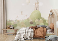 Bold nature scene on a large feature wall in a playroom.