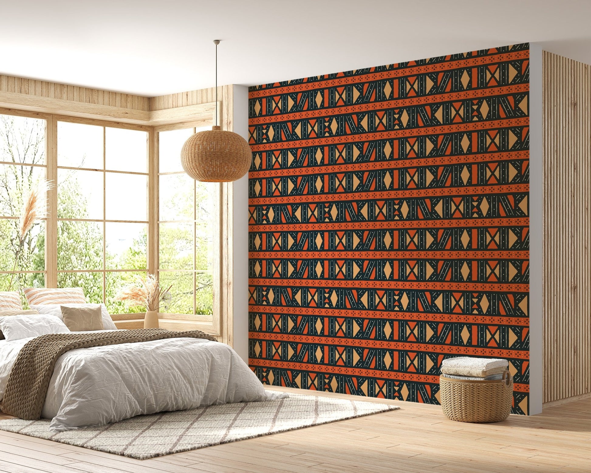 Ethnic wallpaper in a bedroom with a large window and neutral bedding.