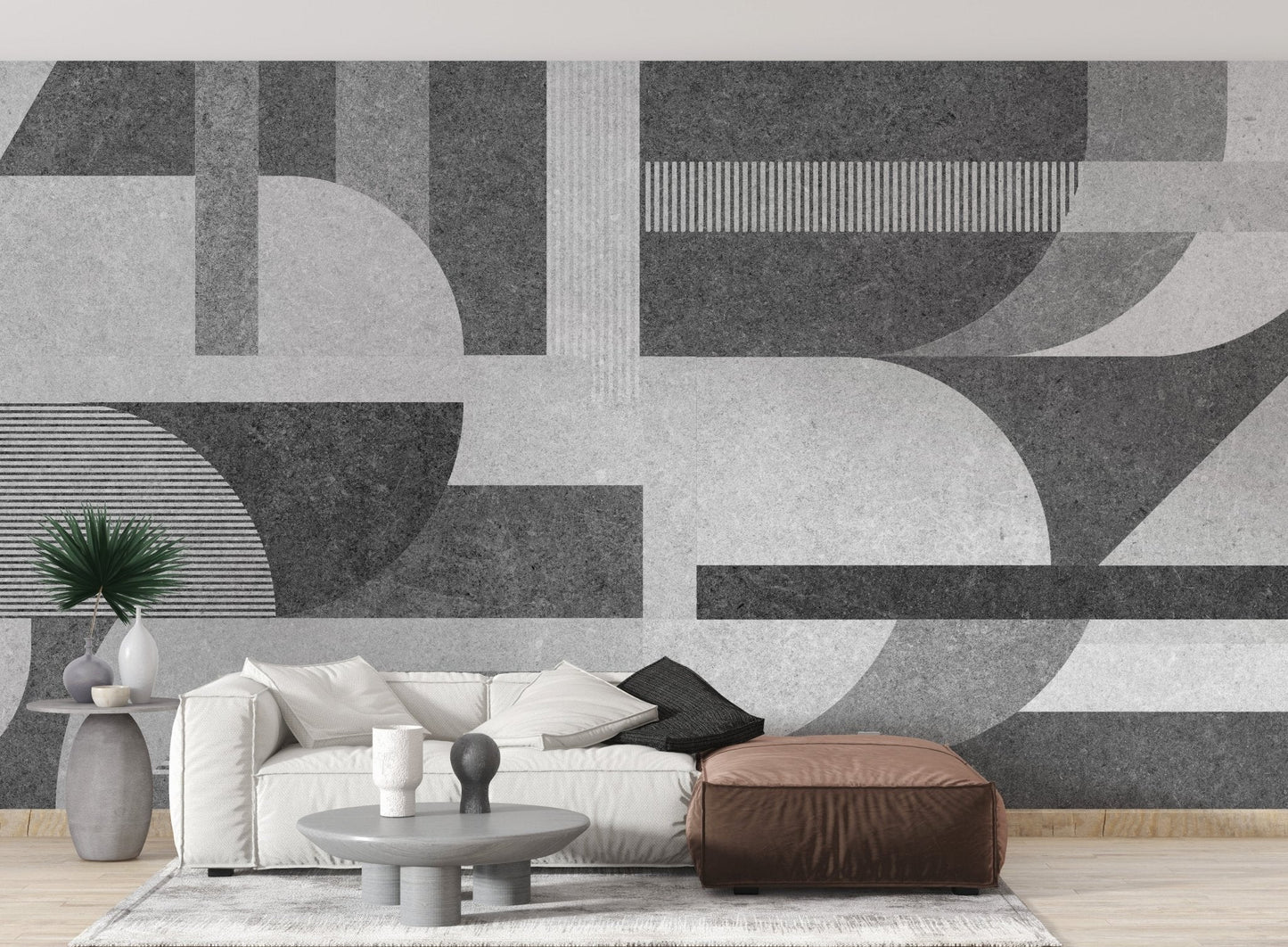 Sleek gray geometric tile mural with a grunge aesthetic in sitting space.
