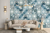 Modern living room showcasing blue floral and geometric wall mural designs.
