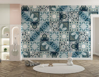 Teal and white geometric wall mural in a bright kids room.
