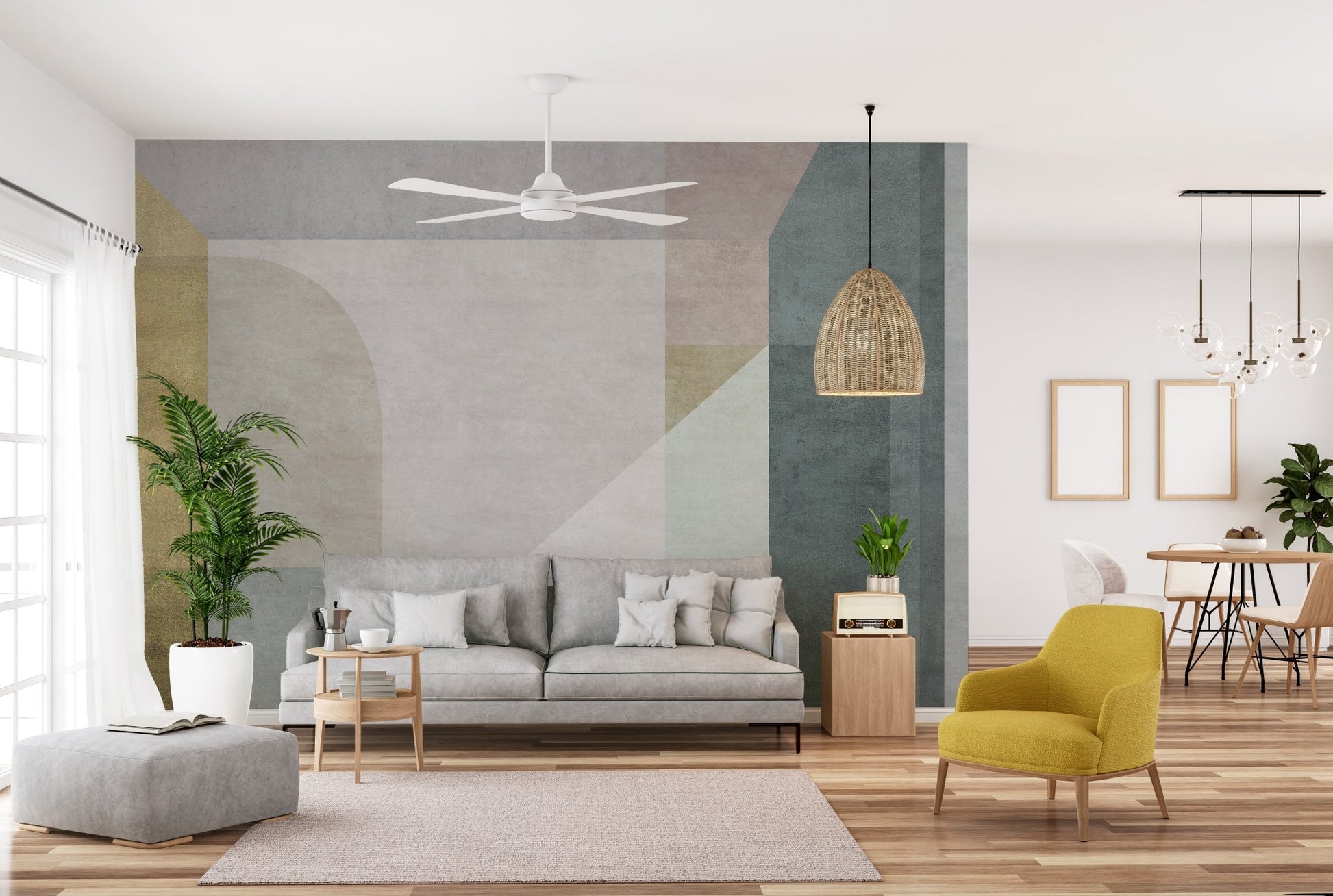 Large scale geometric wall mural in an open plan living space with yellow chair.