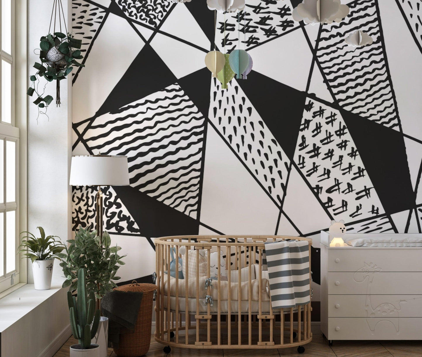 Modern wall mural showcasing black and white geometric patterns.
