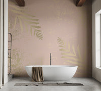 Pink and gold mural featuring artistic gilded blossom designs in bathroom.
