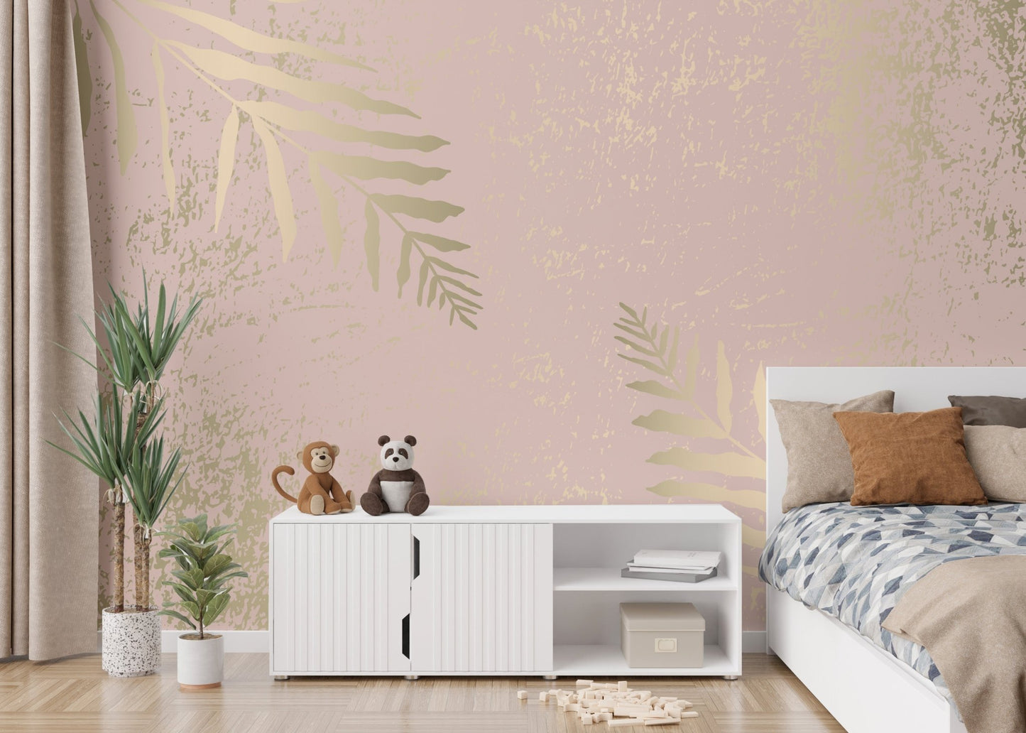 Pink and gold leaf wall mural with elegant gilded blossoms in kids bedroom.
