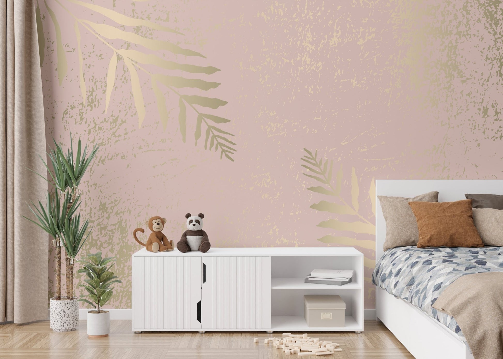 Pink and gold leaf wall mural with elegant gilded blossoms in kids bedroom.

