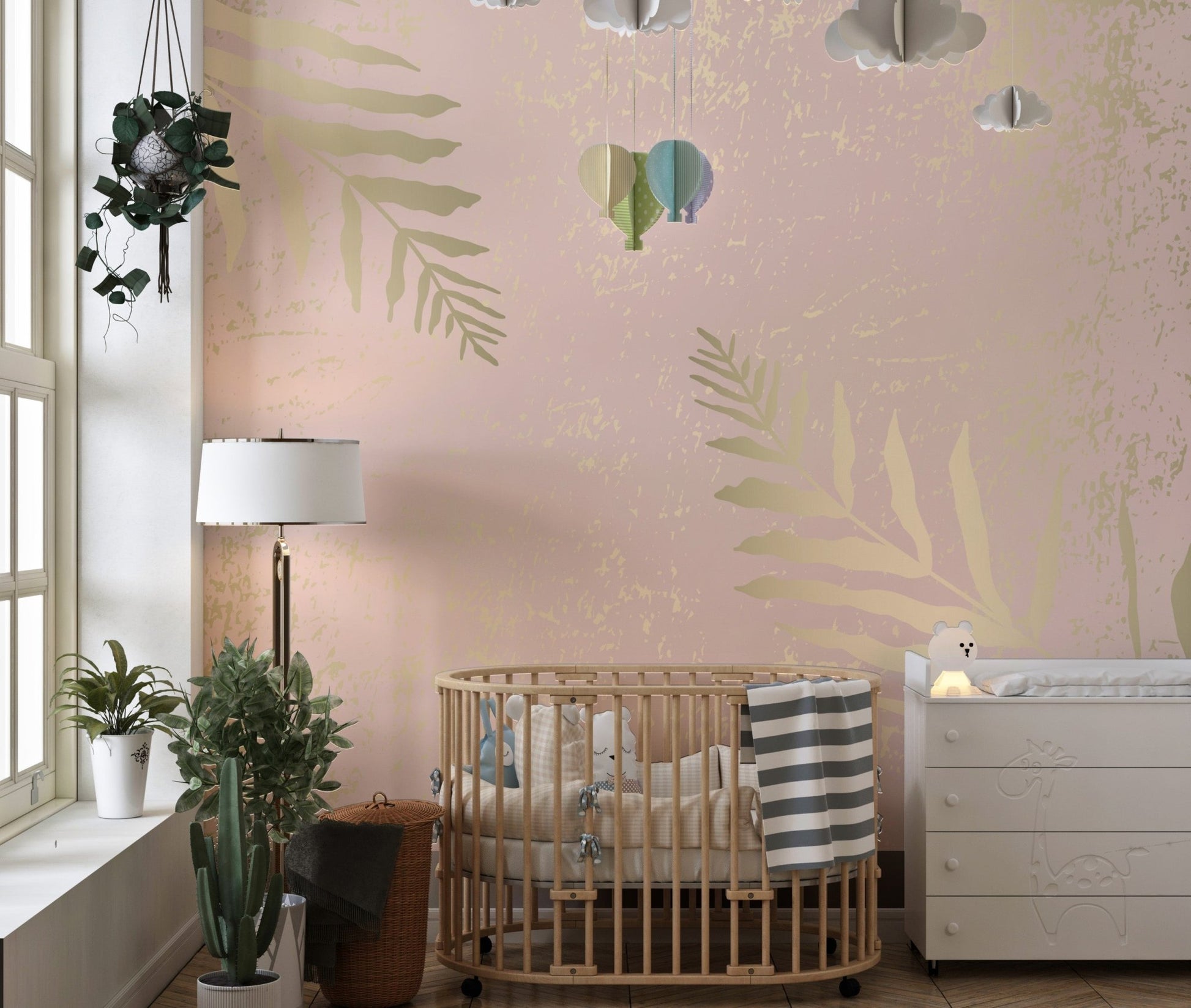 Wall mural showcasing gilded blossoms with pink and gold accents in nursery.
