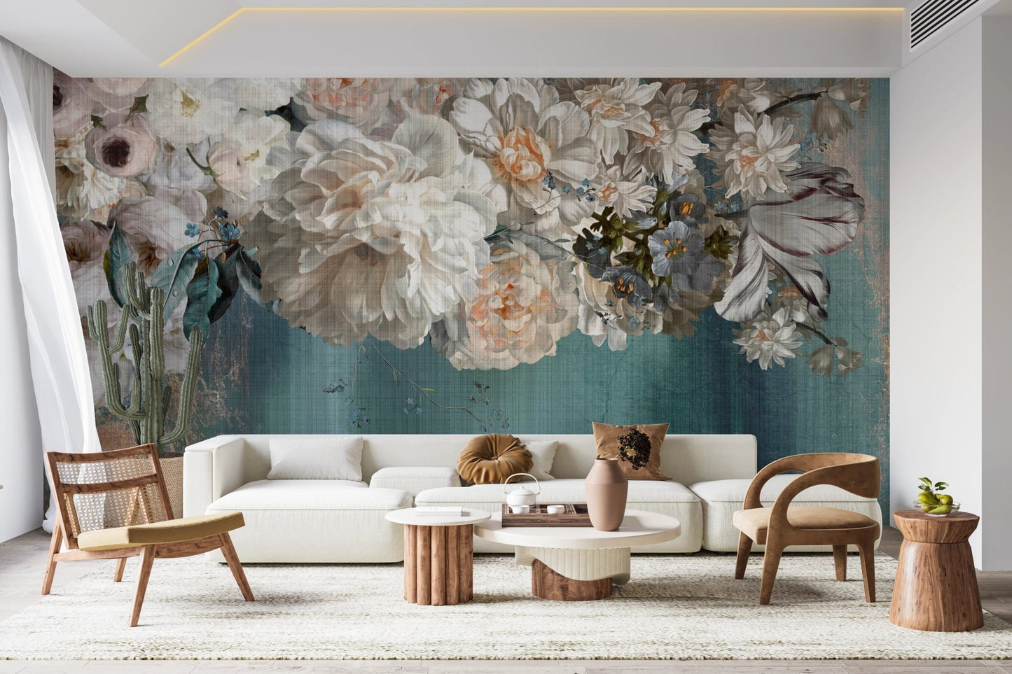 Floral wall mural with white and peach blooms in a bright open-plan flat.