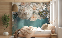Cream and gold floral wall mural in a bedroom with wooden bedside tables.