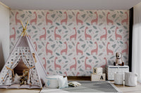 Playful giraffe wallpaper with floral animal motifs and twigs in kids room.