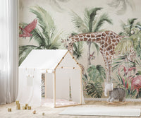Tropical jungle wall mural with giraffes and birds in a room with a white play tent.