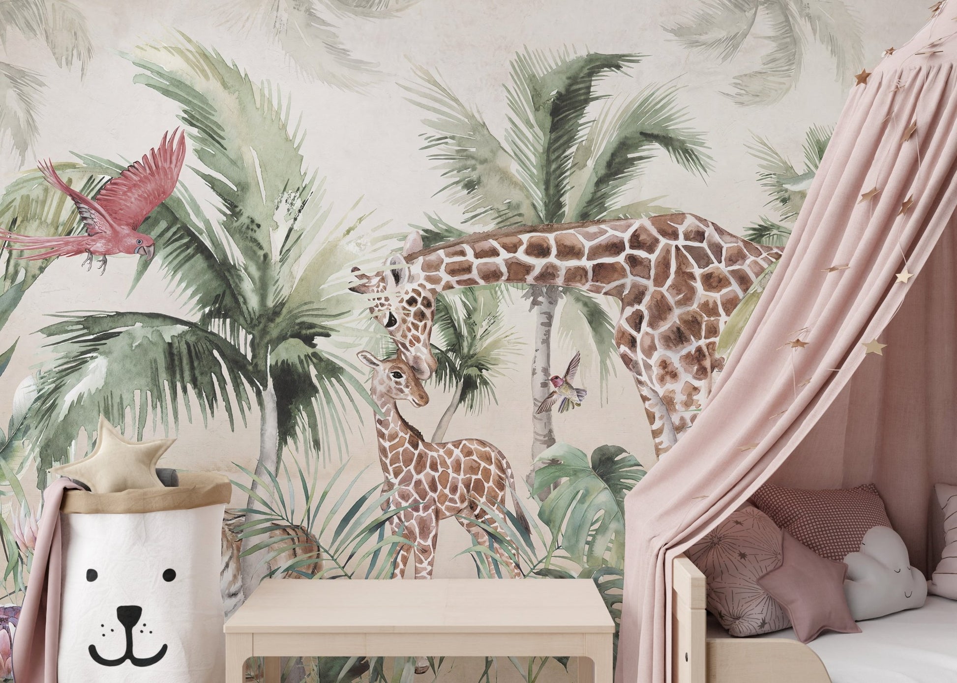 Giraffe and pink bird watercolor wall mural in a child’s bedroom with canopy bed.