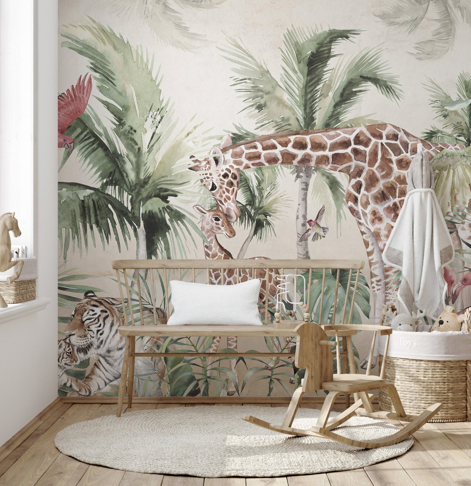 Giraffe and Tiger Forest Wall mural in a playroom featuring a small wooden rocking horse.