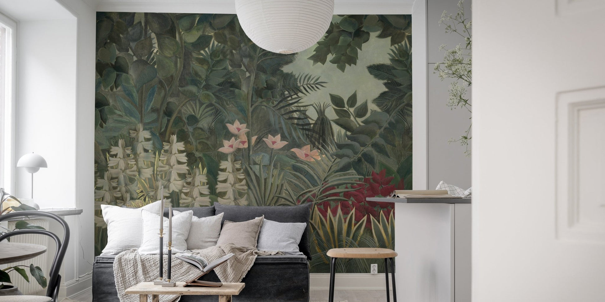 Deep green forest wall mural in minimalist living room.