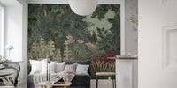Deep green forest wall mural in minimalist living room.