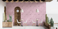 Stylish dining room interior with subtle flamingo wallpaper mural.