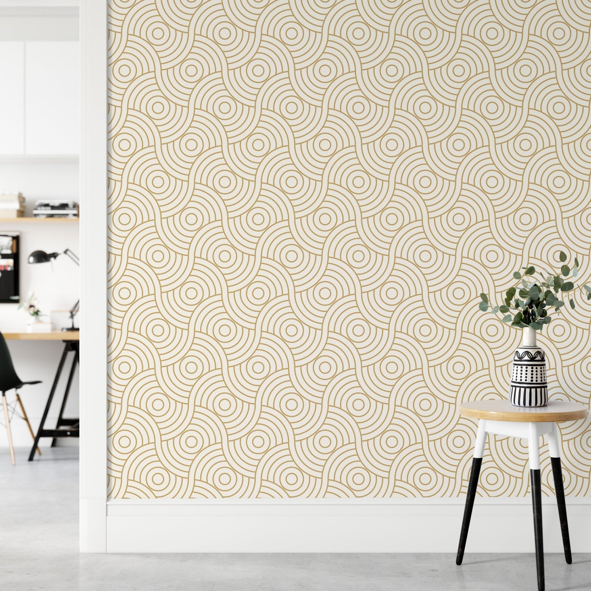 Neutral hallway wall featuring a gold geometric circle pattern wallpaper.