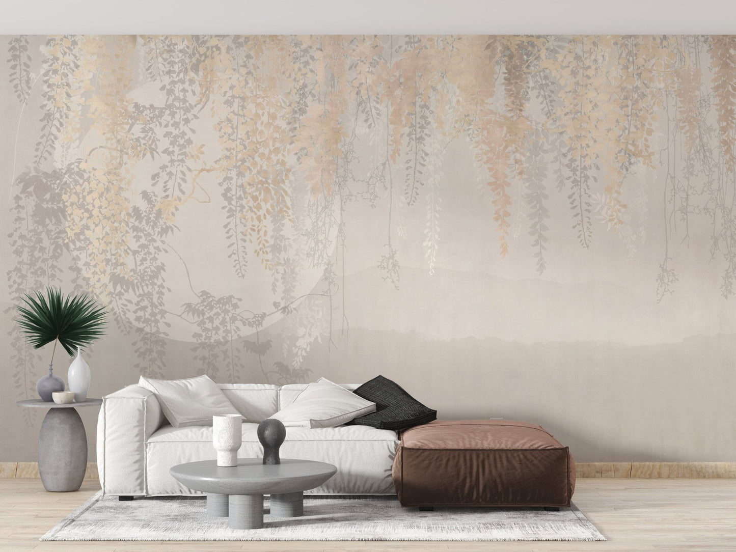 Modern living area wall mural featuring golden leaves and a white sofa.