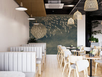 Large scale bird pattern wall mural in commercial restaurant seating area.