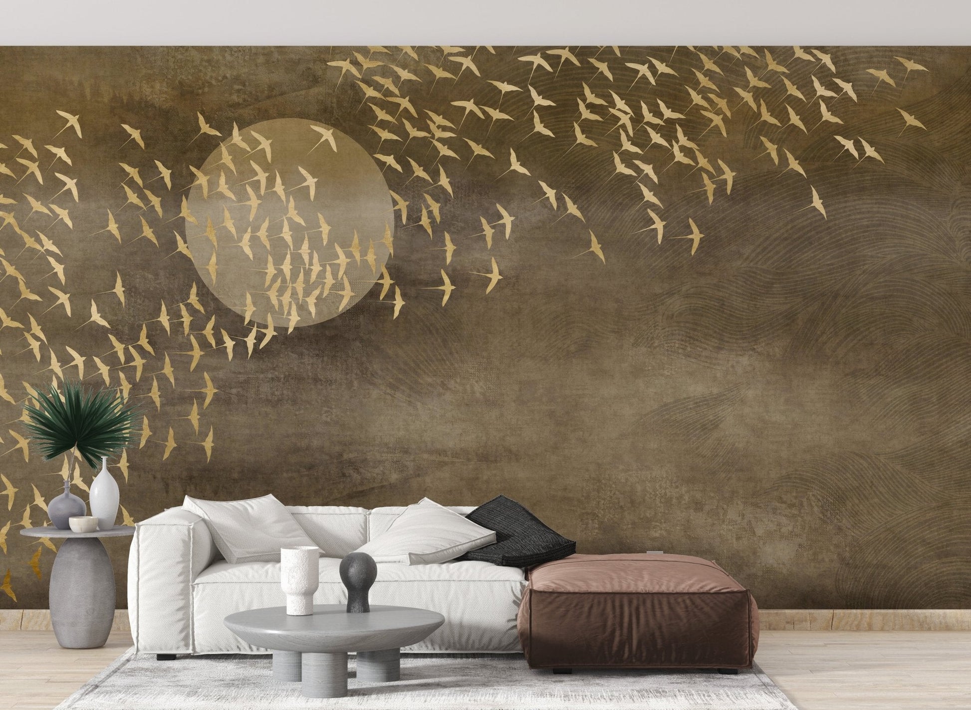 Textured brown wall mural with gold bird motifs in a contemporary seating area.