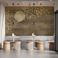 Cafe interior featuring golden birds flying in sky mural on a feature wall.