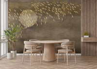 Circular moon and bird wall mural in a bright room with a round dining set.
