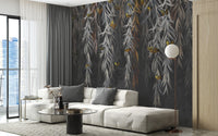 Spacious living room with grey leaves mural and sectional sofa.